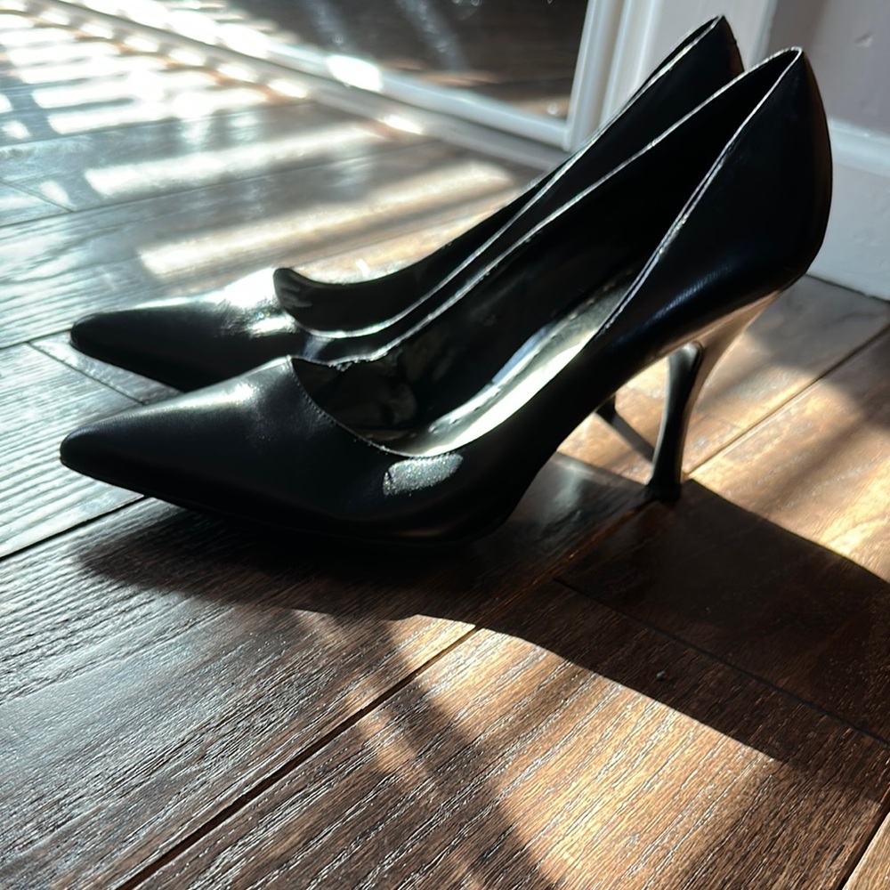 BCBG black Stiletto Heels with Pointed Toe. Rubber Grip bottom size 9.